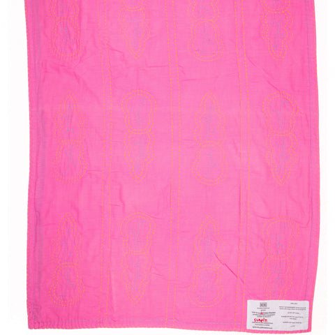 Pink blanket with a pattern on a white background