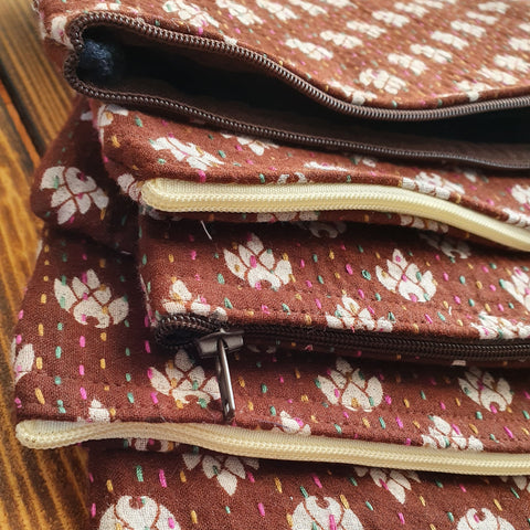 Upcycled sari clutch with kantha stitch