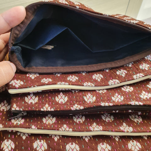 Upcycled sari clutch with kantha stitch