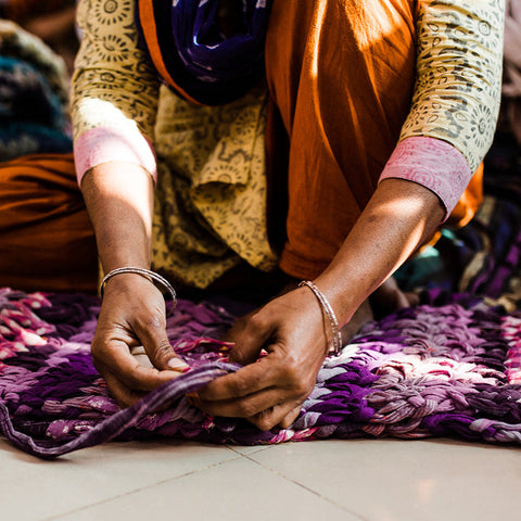 artisan making chunky knit cushion cover