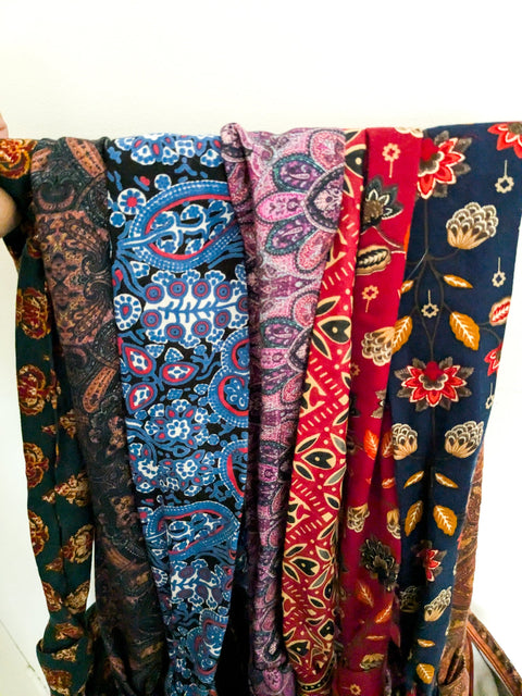 Vibrant crossbody sling handbag with knotted strap