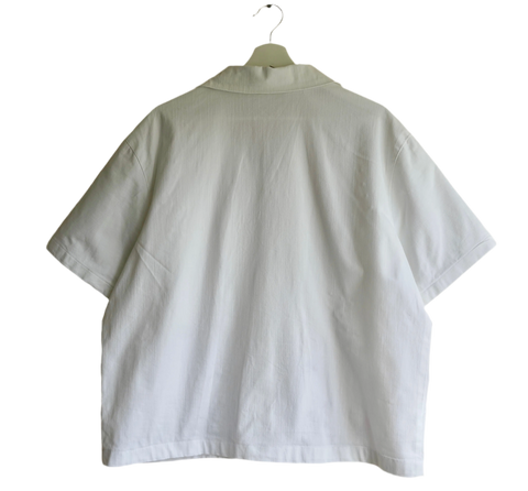 Handmade shirt button up, with flower embroidery from a sustainable fashion brand. Made from recycled materials.