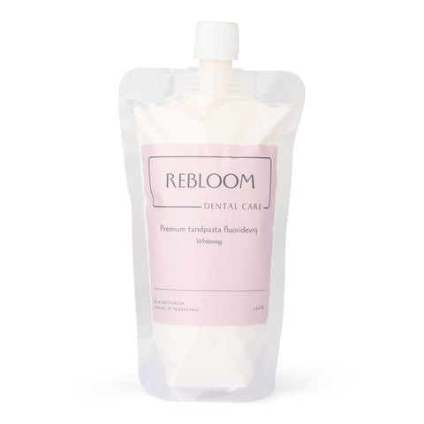 Zak met lichtroze etiket 'rebloom care' premium tandpasta