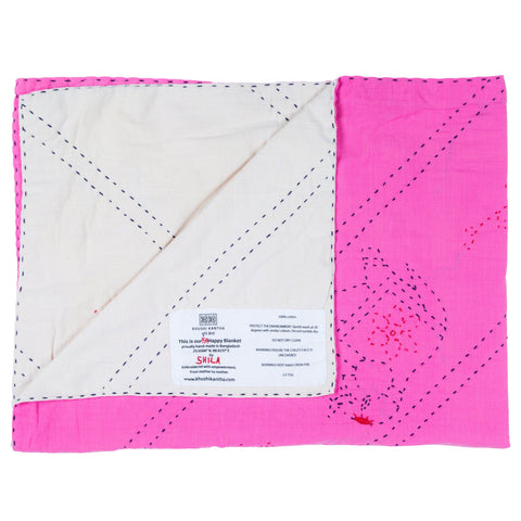 Pink and white quilted fabric with visible stitching on a white background