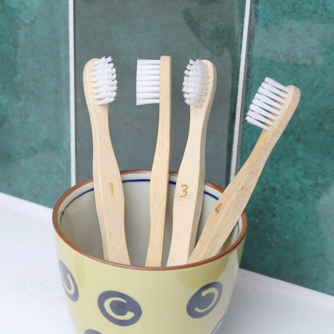 four bamboo toothbrush soft for kids from beewise with numbers from 1 to 4