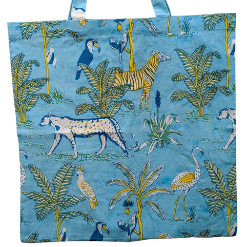 Tote bag with jungle animal pattern on a blue background