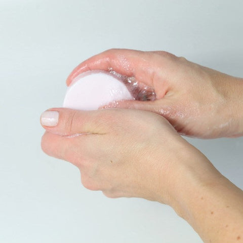 natural & vegan body bar lavender showing washing hands of an adult