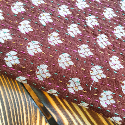 Upcycled sari clutch with kantha stitch