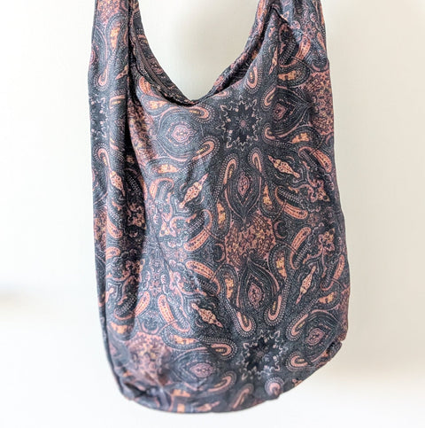 Vibrant crossbody sling handbag with knotted strap