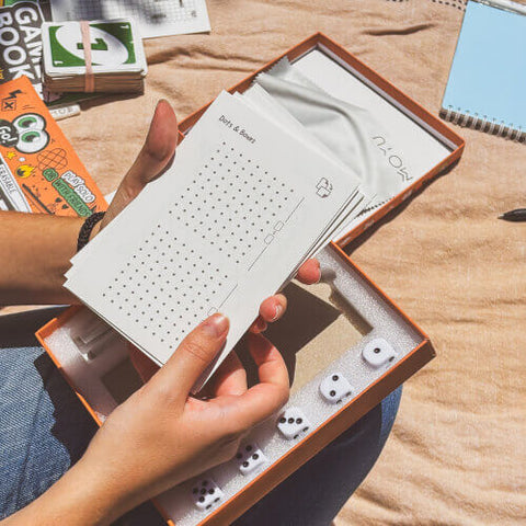 Dots and Boxes game on erasable stone paper