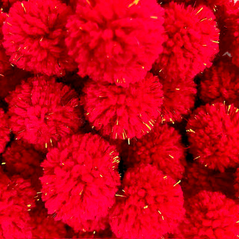 Luna-Leena haar clips pom pom - rood en gold flakes - wol - handgemaakt in Nepal