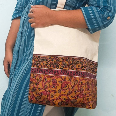 model with half sari tote bag