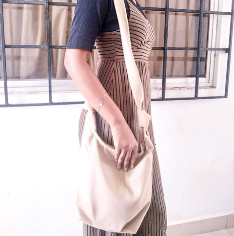 Vibrant crossbody sling handbag with knotted strap