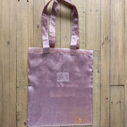 lilac sari tote bag on wooden background