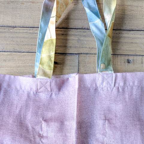 lilac sari tote bag on wooden background
