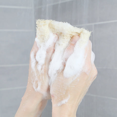 loofah sponge zero waste natural loofah from egypt showing making some bubbles on the hands of an adult