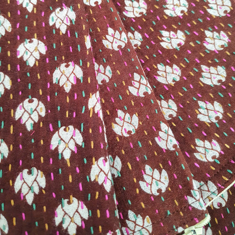 Upcycled sari clutch with kantha stitch