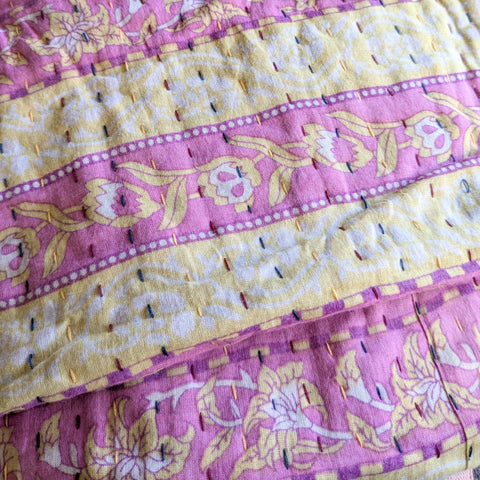 Close-up of pink and yellow patterned fabric