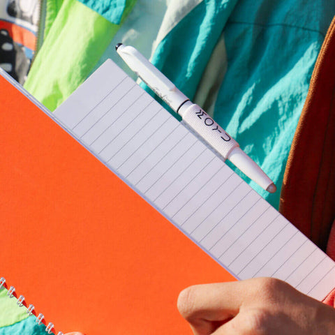 MOYU white-pen-holder in a sunset orange notebook