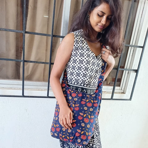 Vibrant crossbody sling handbag with knotted strap