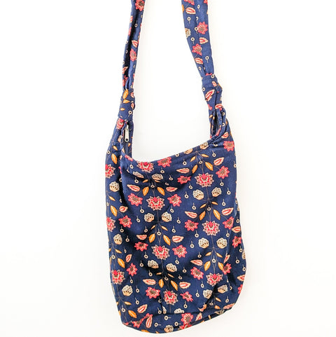Vibrant crossbody sling handbag with knotted strap