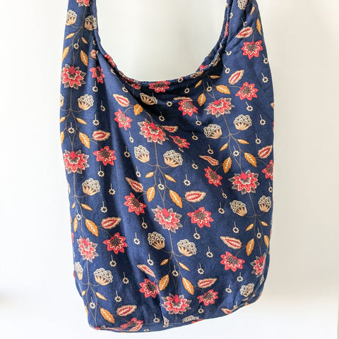 Vibrant crossbody sling handbag with knotted strap