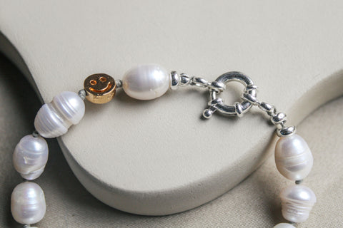 Parel armband met zilveren sluiting