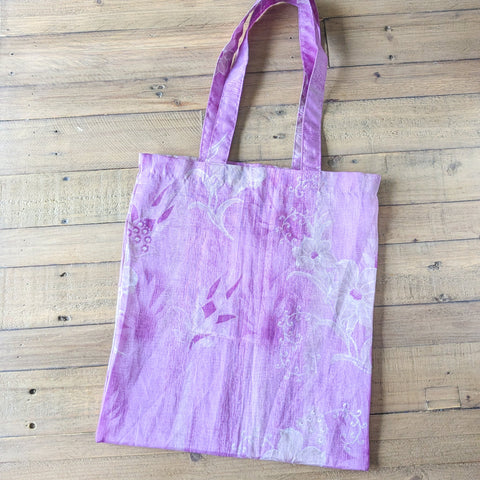 pink sari tote bag on wooden background