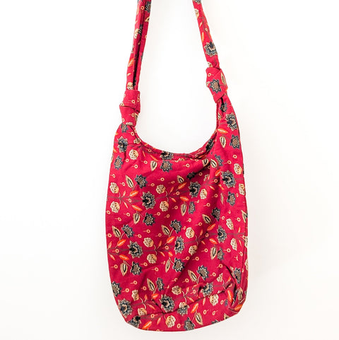 Vibrant crossbody sling handbag with knotted strap