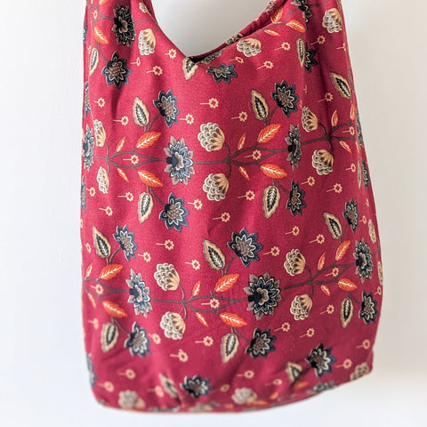 Vibrant crossbody sling handbag with knotted strap