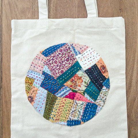 Sari patchwork cotton tote bag against wooden background