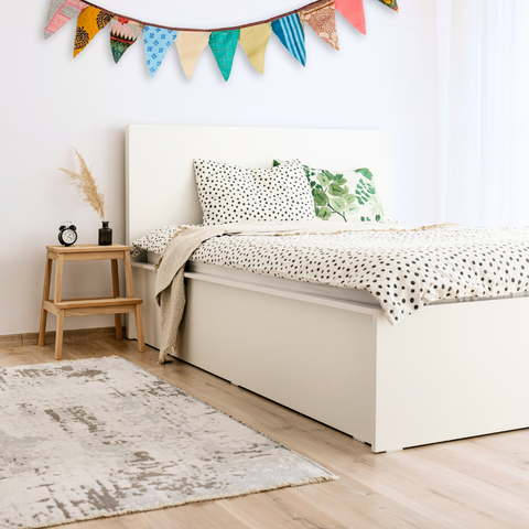 sari flags hung above bed 