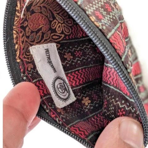 inside colourful sari pouch