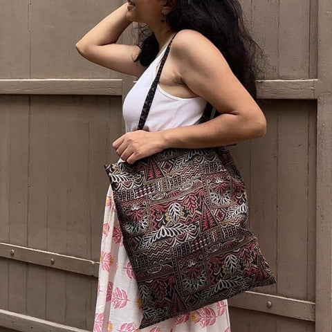 misc sari tote bag held by model
