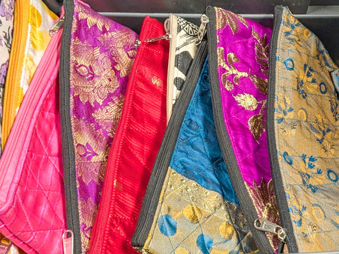 Colourful quilted upcycled sari pouches