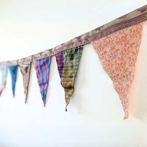 Upcycled sari flags, reusable sari bunting