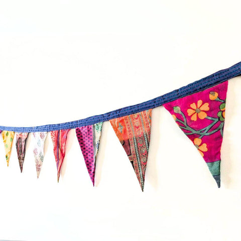 Upcycled sari flags, reusable sari bunting