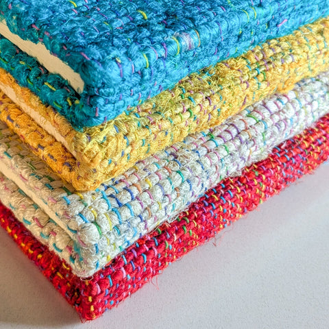 stack of woven fabric a5 notebooks