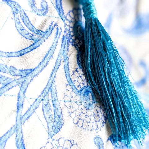 close up view of tassel on pouch